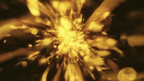 explosion gold lights sparkles. glowing light explodes. flare in center.