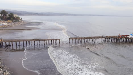 Storms-in-California-in-January-2023-cause-damage-to-the-Capitola-Wharf---aerial-view