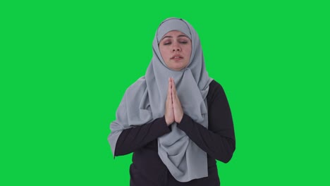 guilty muslim woman saying sorry and apologizing green screen