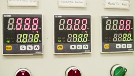 craft beer production factory, brewery manufacture. putting barley malt grains in conveyor close-up. brewing, cooking alcohol in metal vats bottles