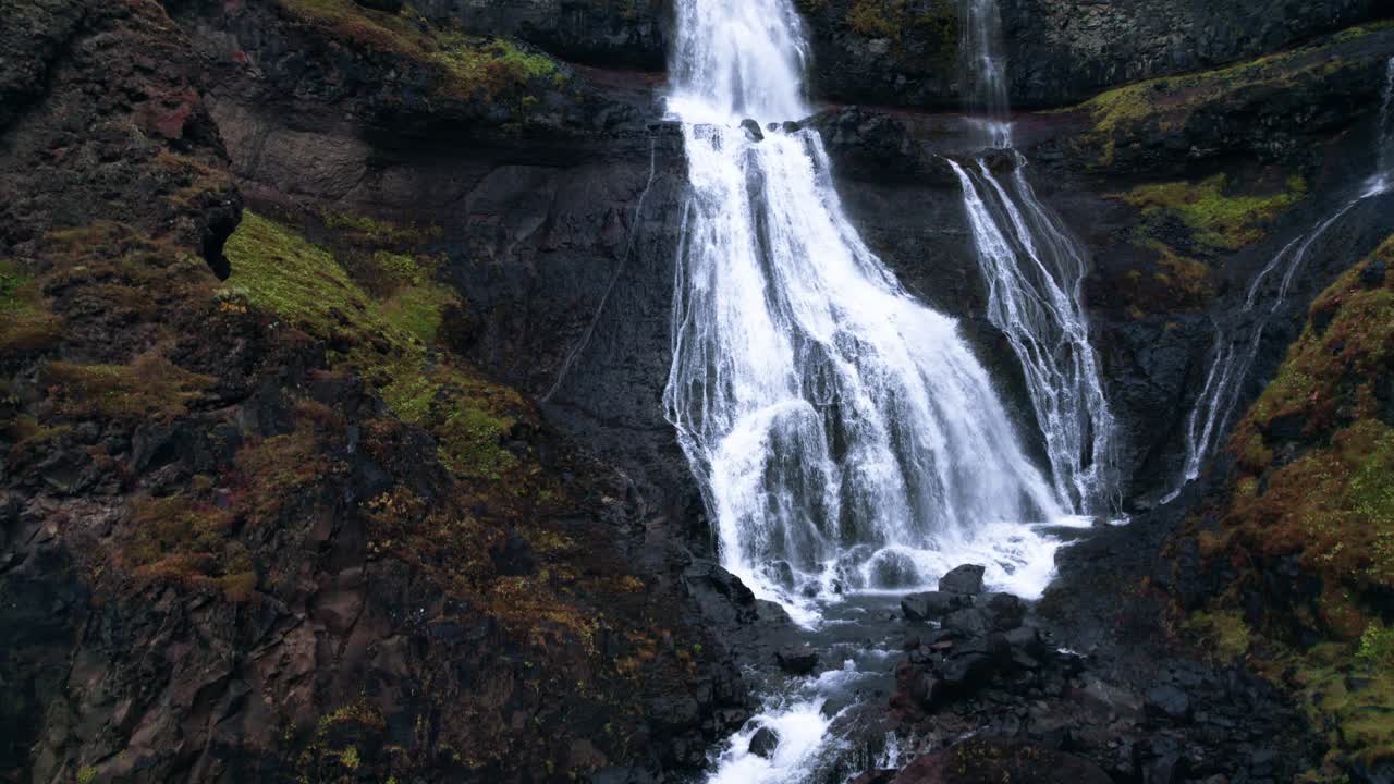 Aerial: Rjukandafoss waterfall, a hidden treasure amidst Iceland's pristine wilderness
