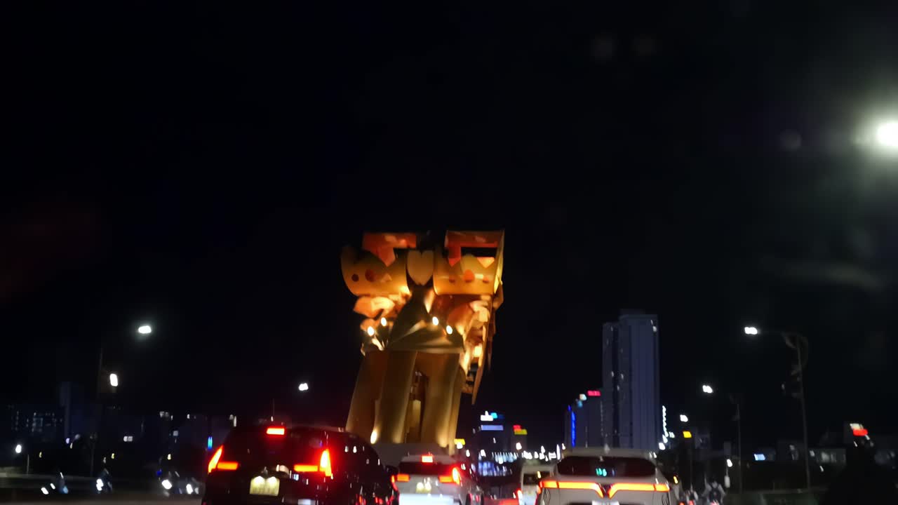 Motoring on Da Nang's Dragon Bridge gives a closer look at its arches and supports.