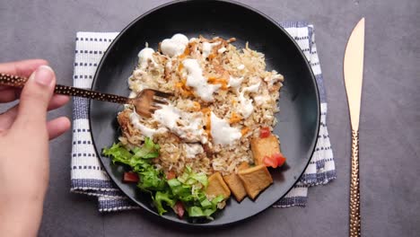 delicious chicken and rice plate with salad and tofu