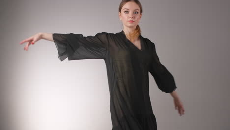 woman in a black dress