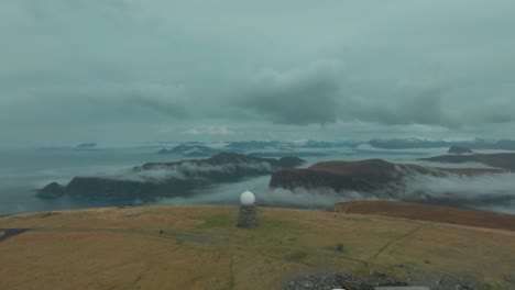 cycling tourist at vestkapp viewpoint in norway