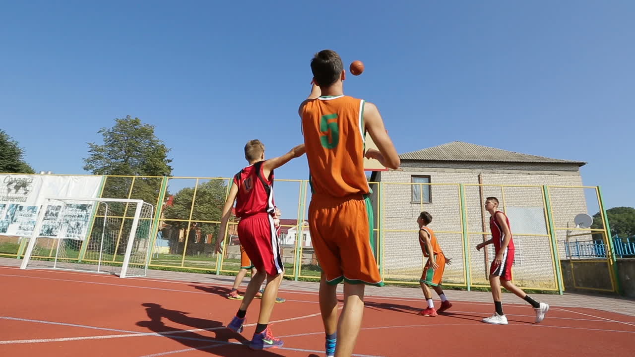 Players Training Outdoors. BAR, UKRAINE - AUGUST 2017: Street basketball players performing outdoors