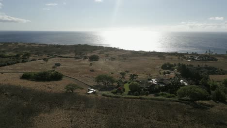 sun reflects silver on ocean: large ranch estates on hawaii big island