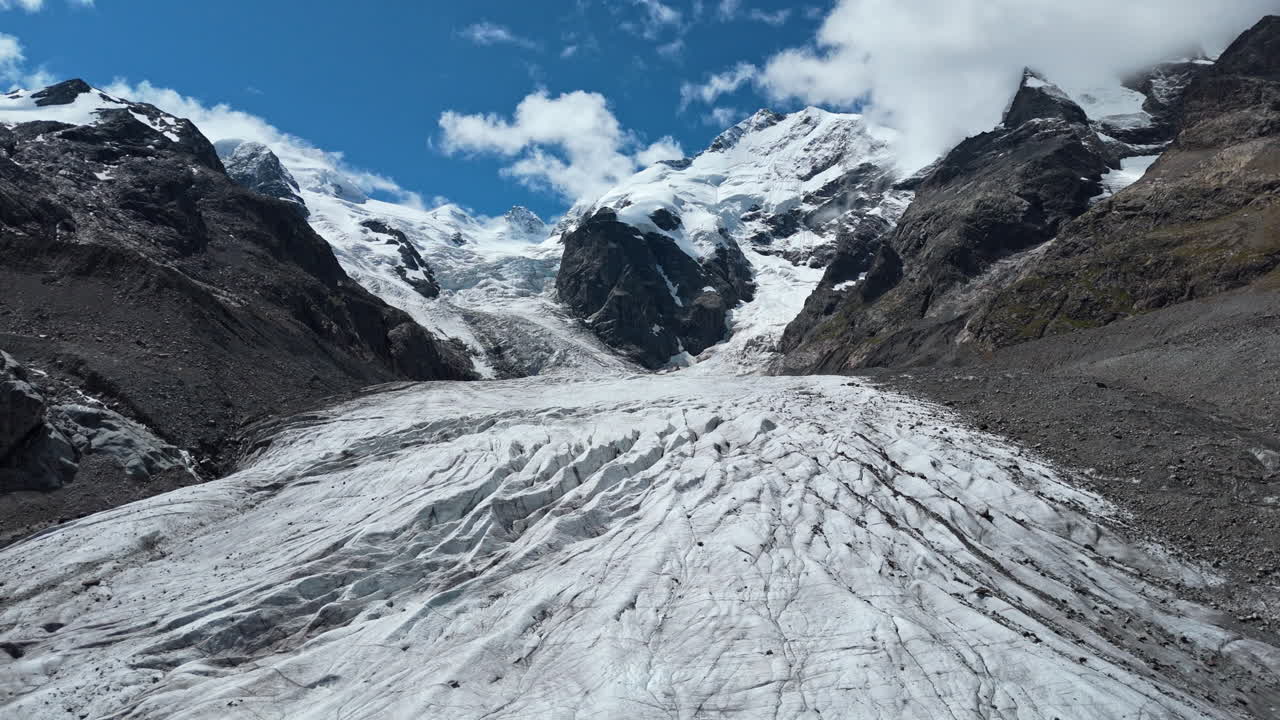 Majestic view of Morteratsch Glacier under a clear blue sky