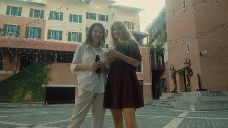 Mother and Daughter Talking Outdoors