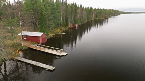 idyllic landscape of still water with mirror reflections in sweden