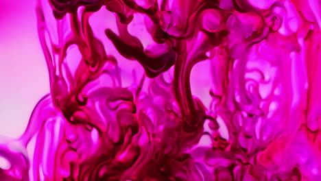 flowing pink and red liquid shapes animation over abstract background