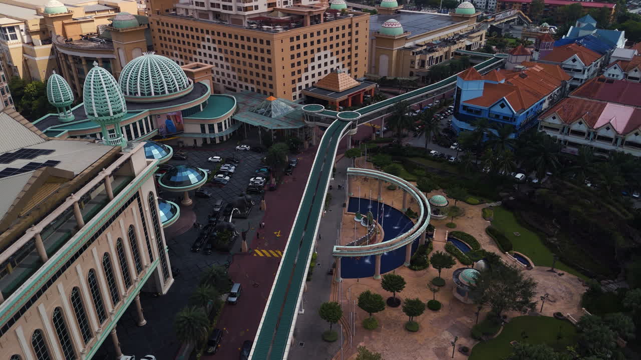 Aerial view tilting over the Sunway city area, daytime in Kuala Lumpur, Malaysia