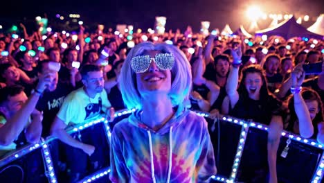 energetic crowd at a nighttime music festival