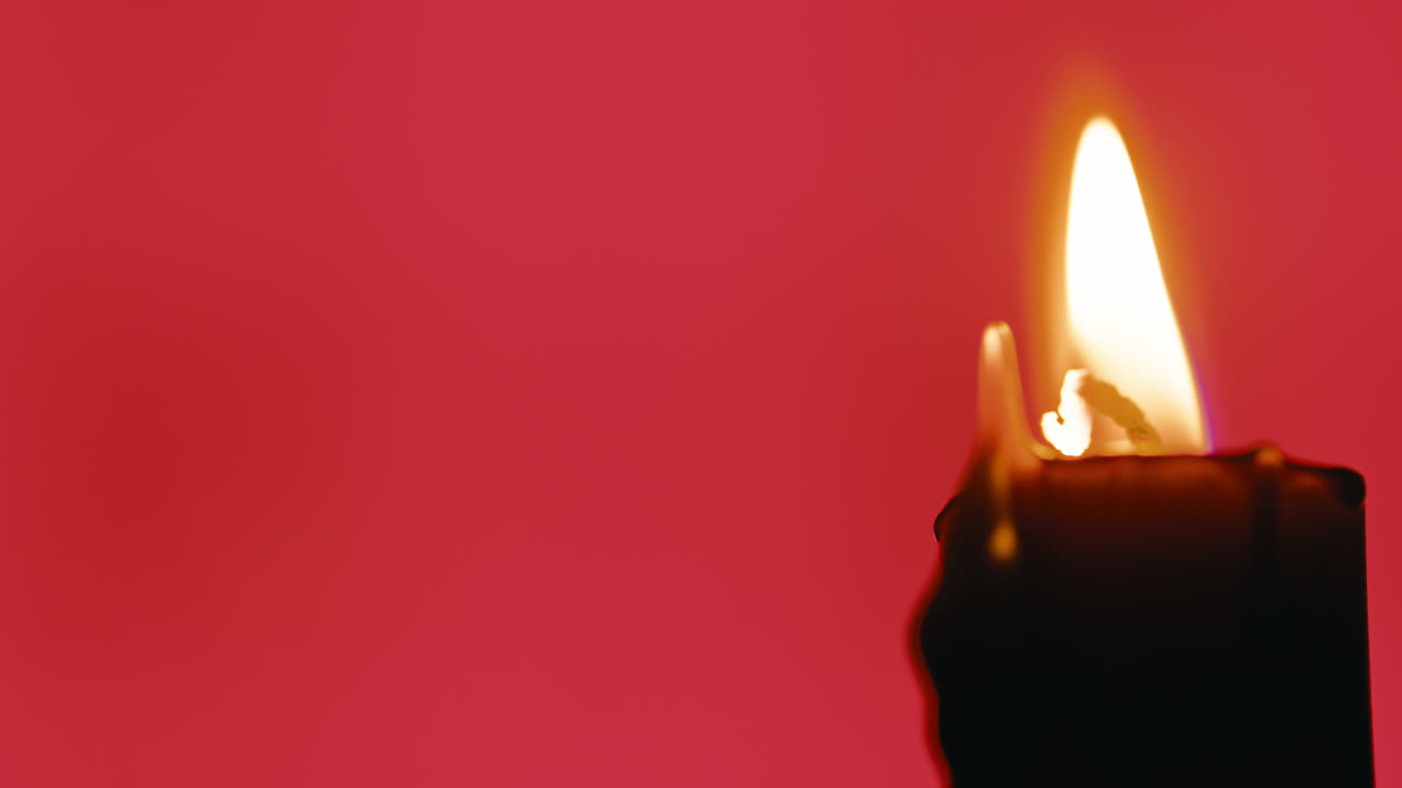 Halloween candle close up with copy space on the left