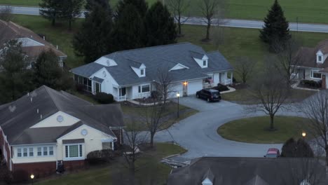 long aerial zoom of cottages at retirement home in america