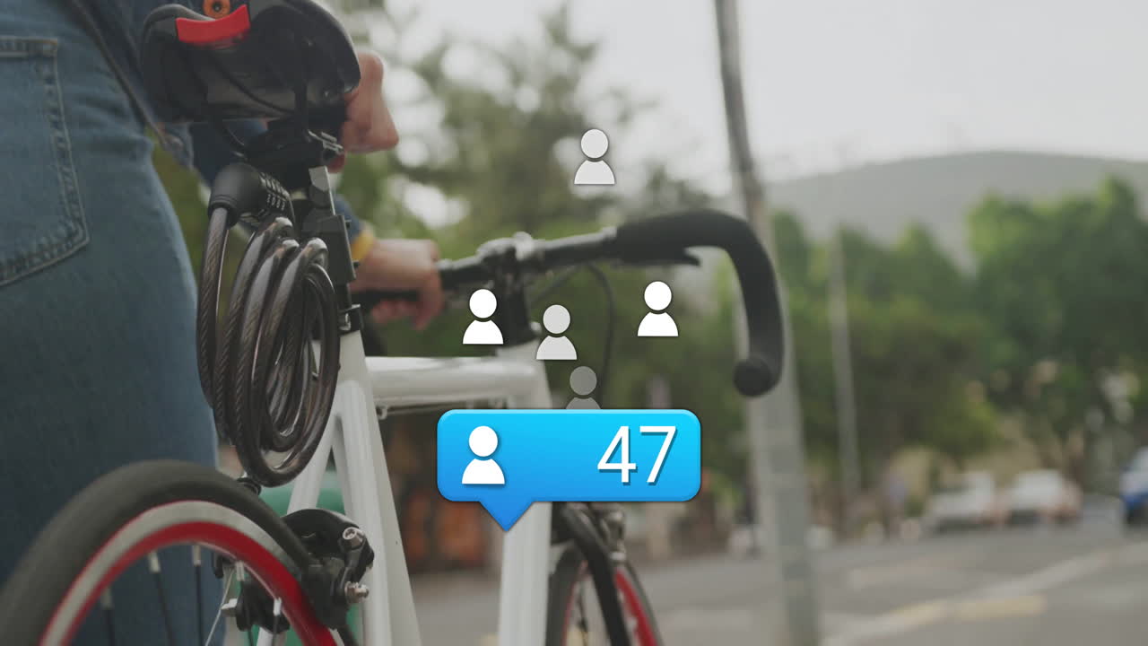 Holding bicycle, person surrounded by animation of social media notification icons