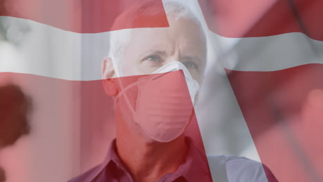 animation of flag of denmark waving over man in face masks