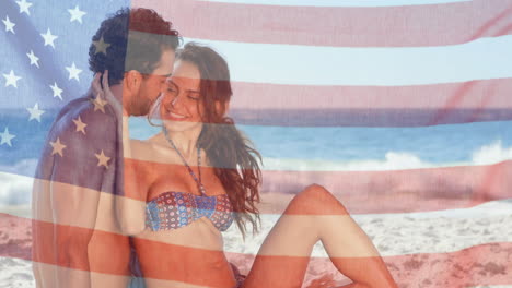 animación de la bandera de los ee.uu. sobre una pareja caucásica en la playa en verano