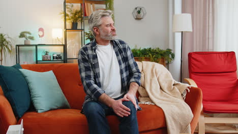 middle-aged man suffer from painful severe knee joint ache, leg muscles illness cramps rheumatism