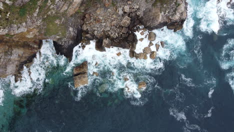 drone going up revealing beautiful rocky cliffs