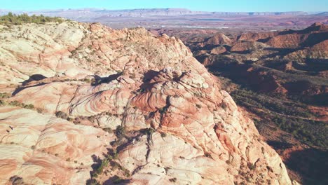 Aerial-Circle-View-of-Orange-and-White-Mountains-in-Yant-Flats,-Utah-near-St