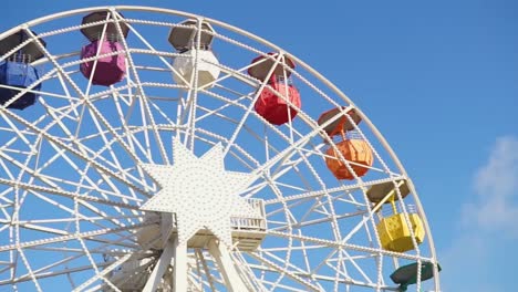 ferris wheel riding in amusement park on sunny day