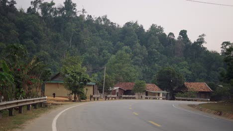 country road through a village in the mountains
