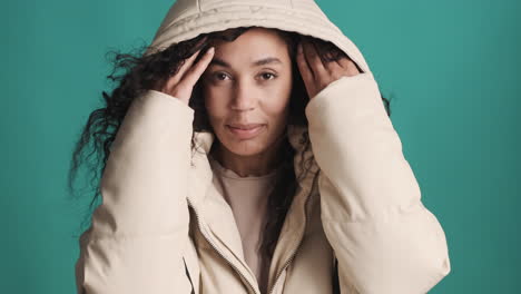 African-american-cute-woman-over-blue-background.