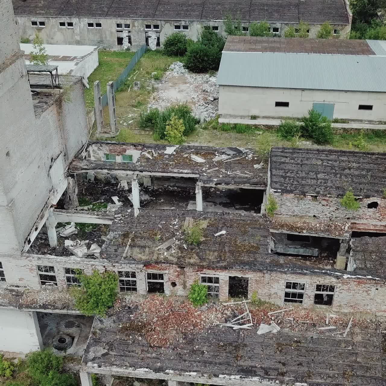 Ruins of an old factory. Old industrial building for demolition. Aerial view