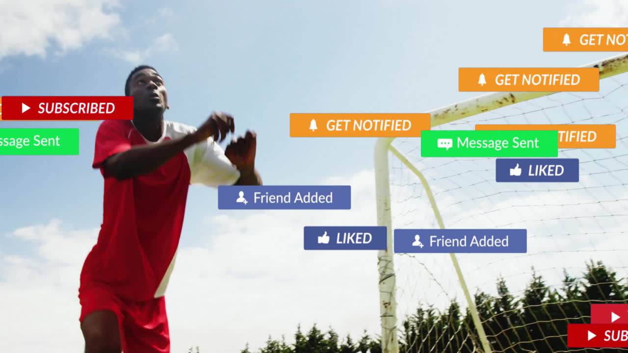 Soccer player in red uniform with animation of social media notifications in sky