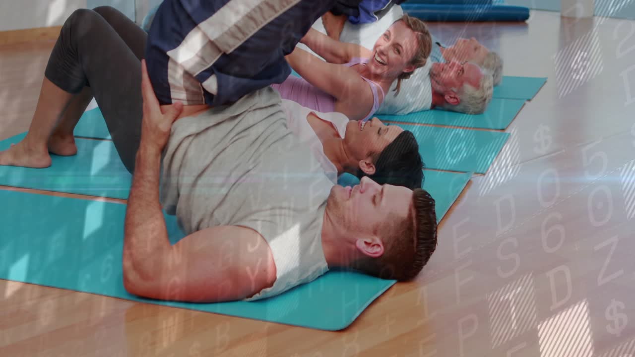 Base partner lifting hips and holding partner mounting on teal mats, group building core fitness