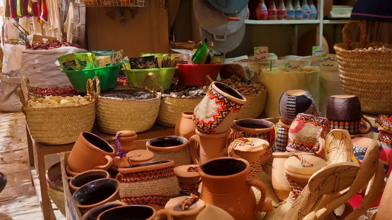 Traditional Moroccan Market: Clay Pots, Spices, and Handicrafts