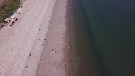 An-aerial-view-of-the-beautiful-pebble-beaches-of-Budleigh-Salterton,-a-town-on-the-Jurassic-Coast-in-East-Devon,-England-near-Exeter