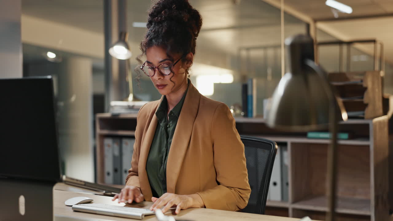 Woman Working Late at Night in Office