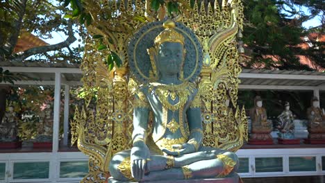 incredible ornamented golden buddha in a chiang mai temple, thailand.