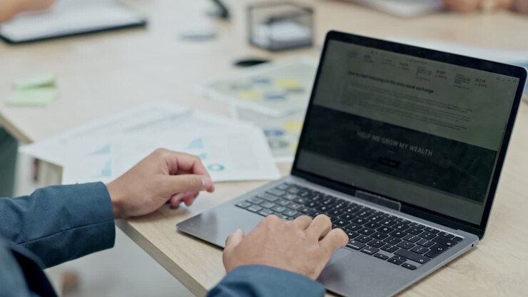 Businessman, hands and laptop on website