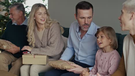 group of caucasian family spending christmas together at home.