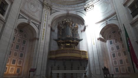majestic pipe organ takes center stage within the grand interior of the national pantheon, lisbon, portugal, showcasing intricate details and historical significance