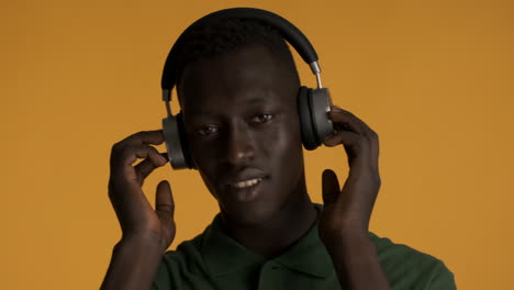 African-american-man-on-yellow-background.