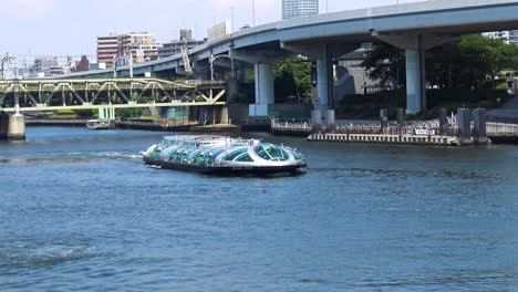 timelapse, tourist boat on the river in asakusa, tokyo japan