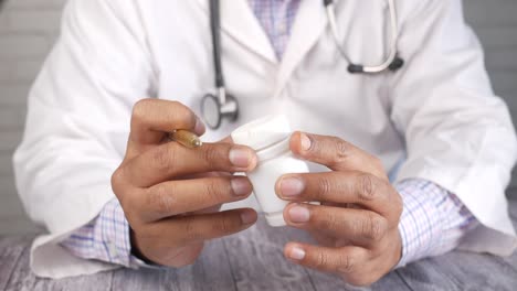 doctor holding a prescription bottle