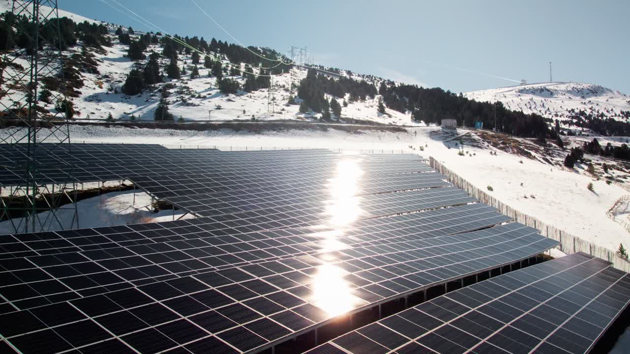Solar panels on a mountain side, aerial medium orbit