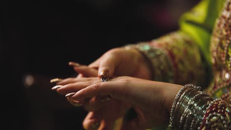asian bride wearing her exquisite traditional jewelry up close