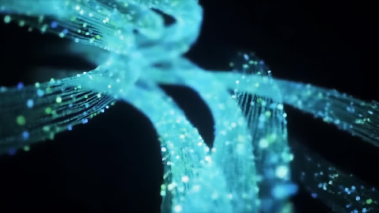 A Captivating Journey Through a Mesmerizing Digital Landscape of Glowing Particles and Fluid Motions, Evoking the Depths of Imagination and Technology