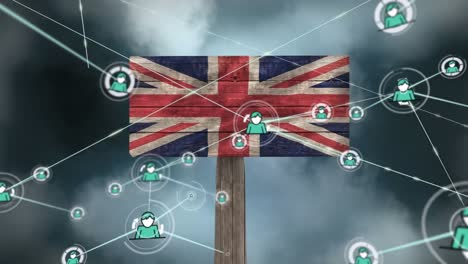 animation of network of connections with icons and clouds over flag of uk