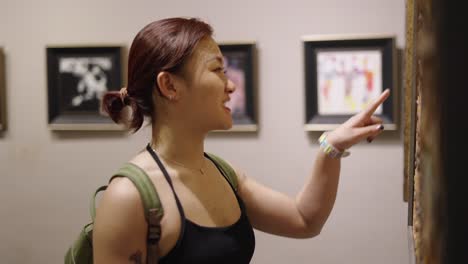 woman viewing art in a museum