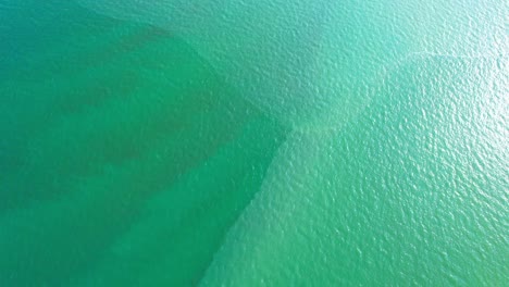 4k aerial view of drone move on beautiful sea. flight over ocean, open sea. dynamic aerial shot.