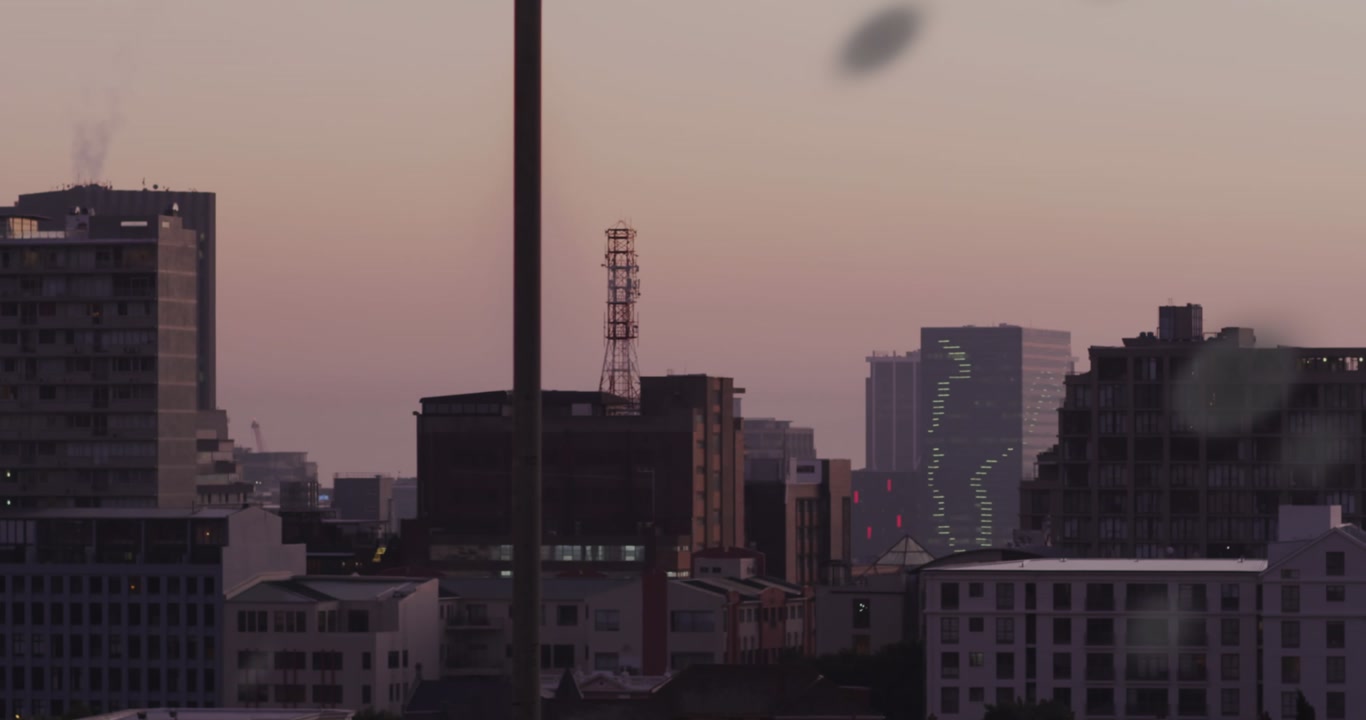 A cityscape with tall skyscrapers and buildings