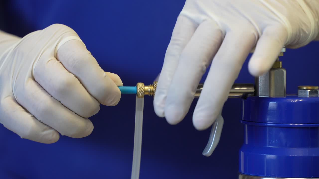 Preparing Cryo Gun for dermatological treatment