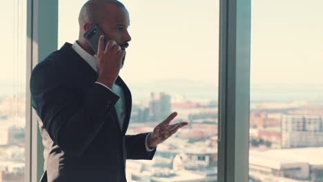 CEO,-businessman-and-phone-call-at-window